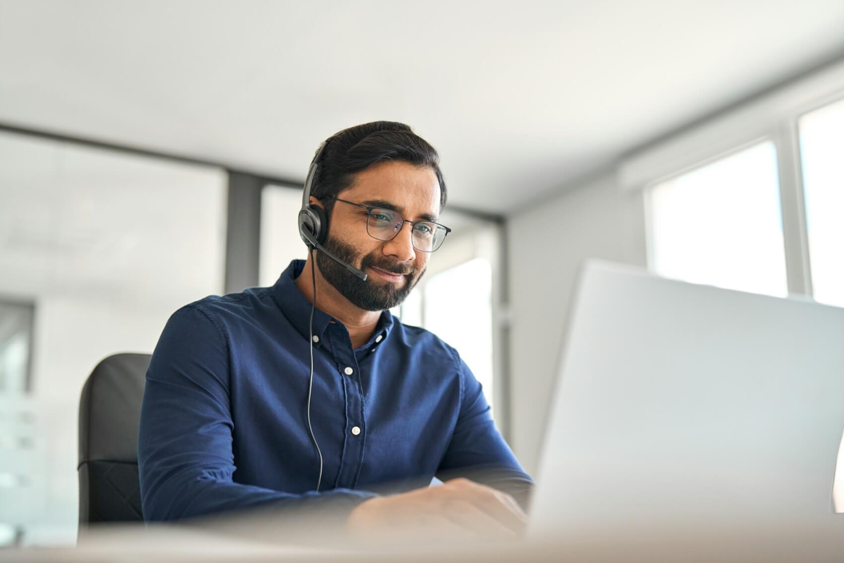 indian-call-center-agent-wearing-headset-working-on-customer-support-service-.jpg